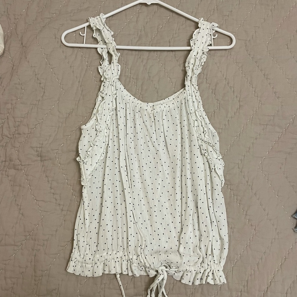 White with black dots tank